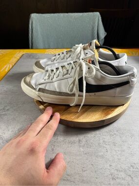 Nike White Leather Low-Top Sneakers with Black Swoosh